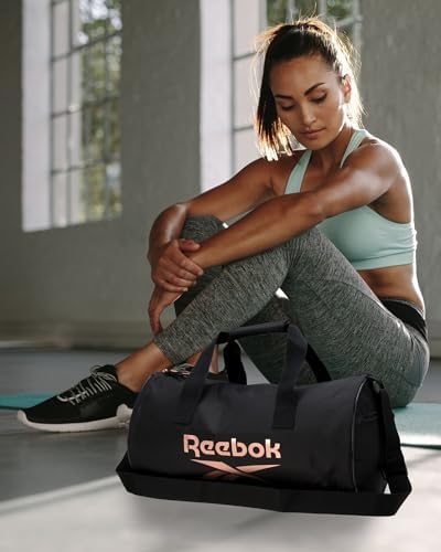 Reebok Duffle Bag - Unisex Lightweight Gym, Sports and Travel Mini Carry On Weekender Bags for Women and Men, Size One Size, Plyo Jet Black With Rose Logo - Image 2